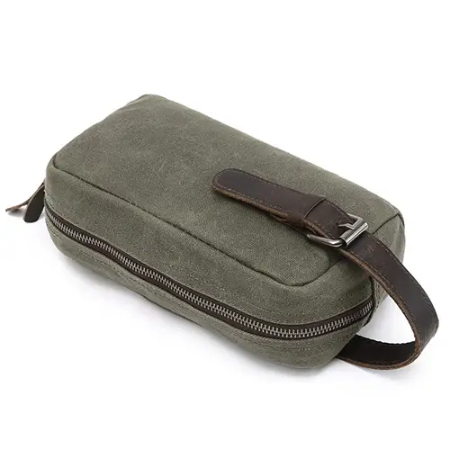 Leak-proof interior lining of a travel wash bag protecting clothes and electronics inside a suitcase